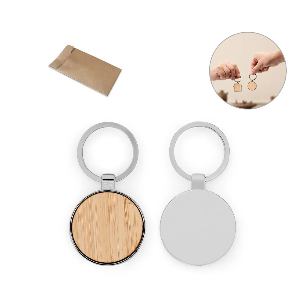GASTON ROUND. Chaveiro em ferro com formato redondo em zinco e bambu